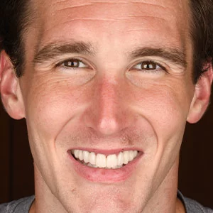 Smiling patient shown by Walden Dental